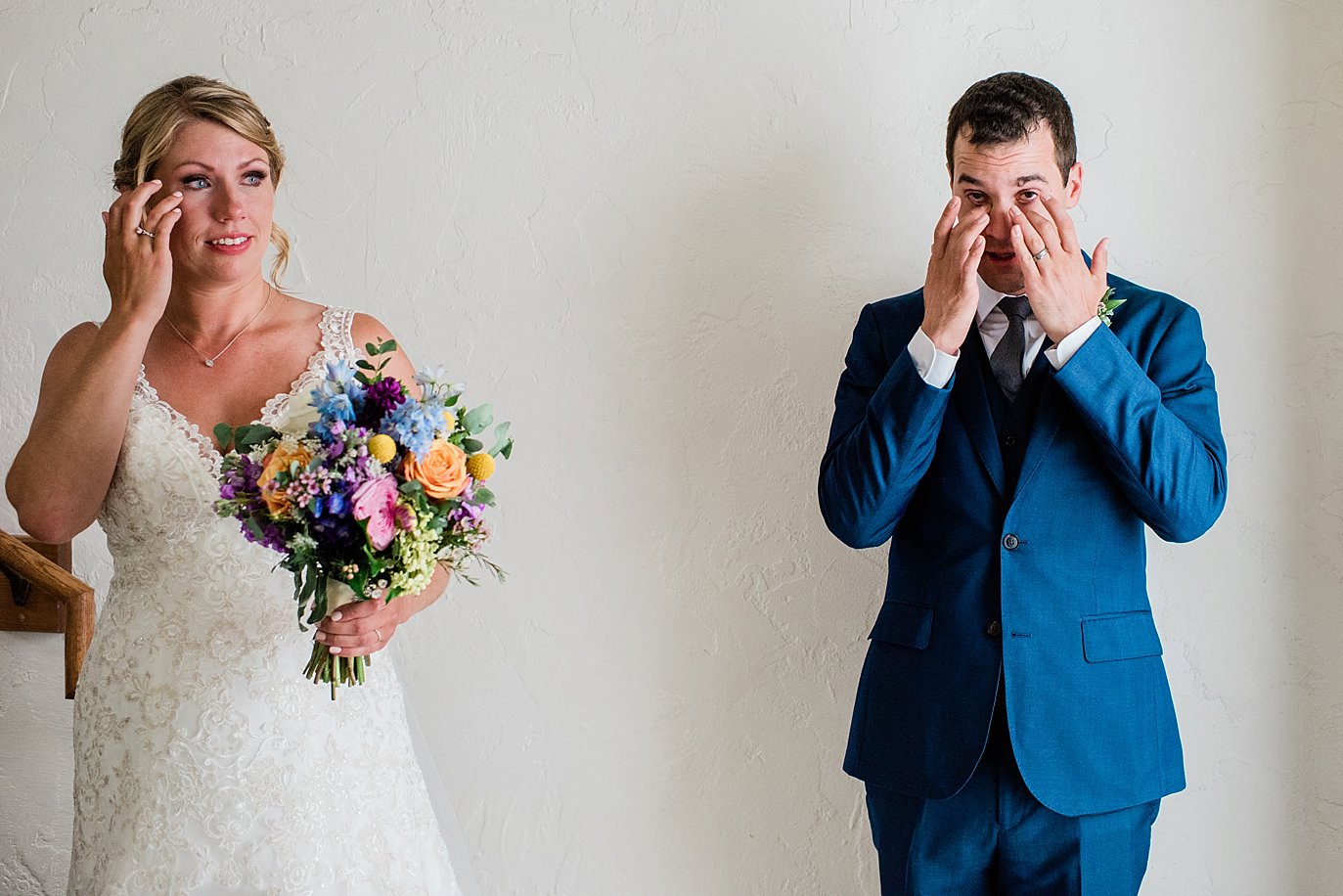 emotional couple after Vail Interfaith Chapel Wedding ceremony by Beaver Creek wedding photographer Jennie Crate