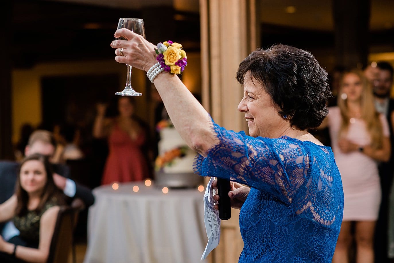 toasts at Summer Sonnenalp Hotel Vail wedding by Vail wedding photographer Jennie Crate