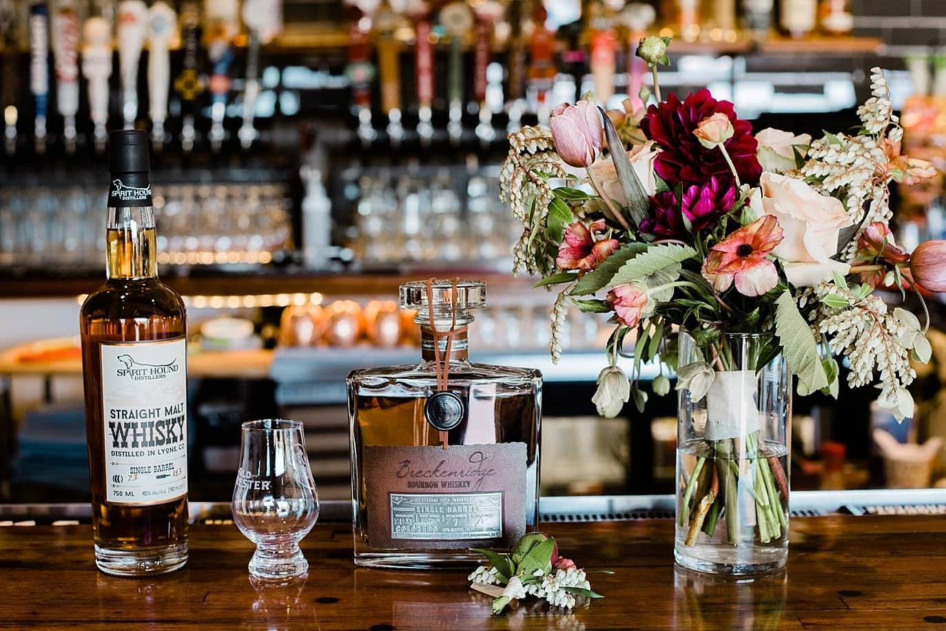 whiskey display at Northgate Event Center wedding by Thornton wedding photographer Jennie Crate