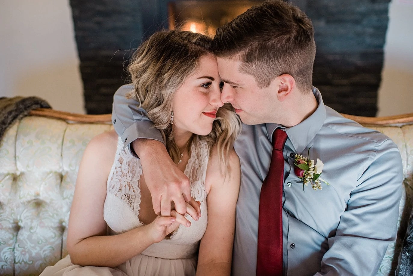 bride and groom intimate snuggles at Northgate Event Center wedding by Thornton wedding photographer Jennie Crate