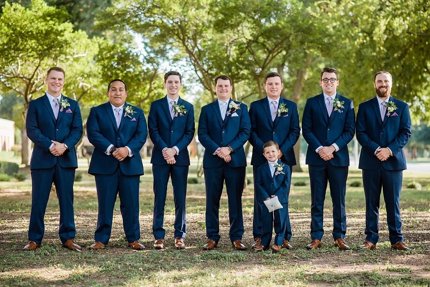 groom and groomsmen in blue suits at Wichita Falls Wedding 