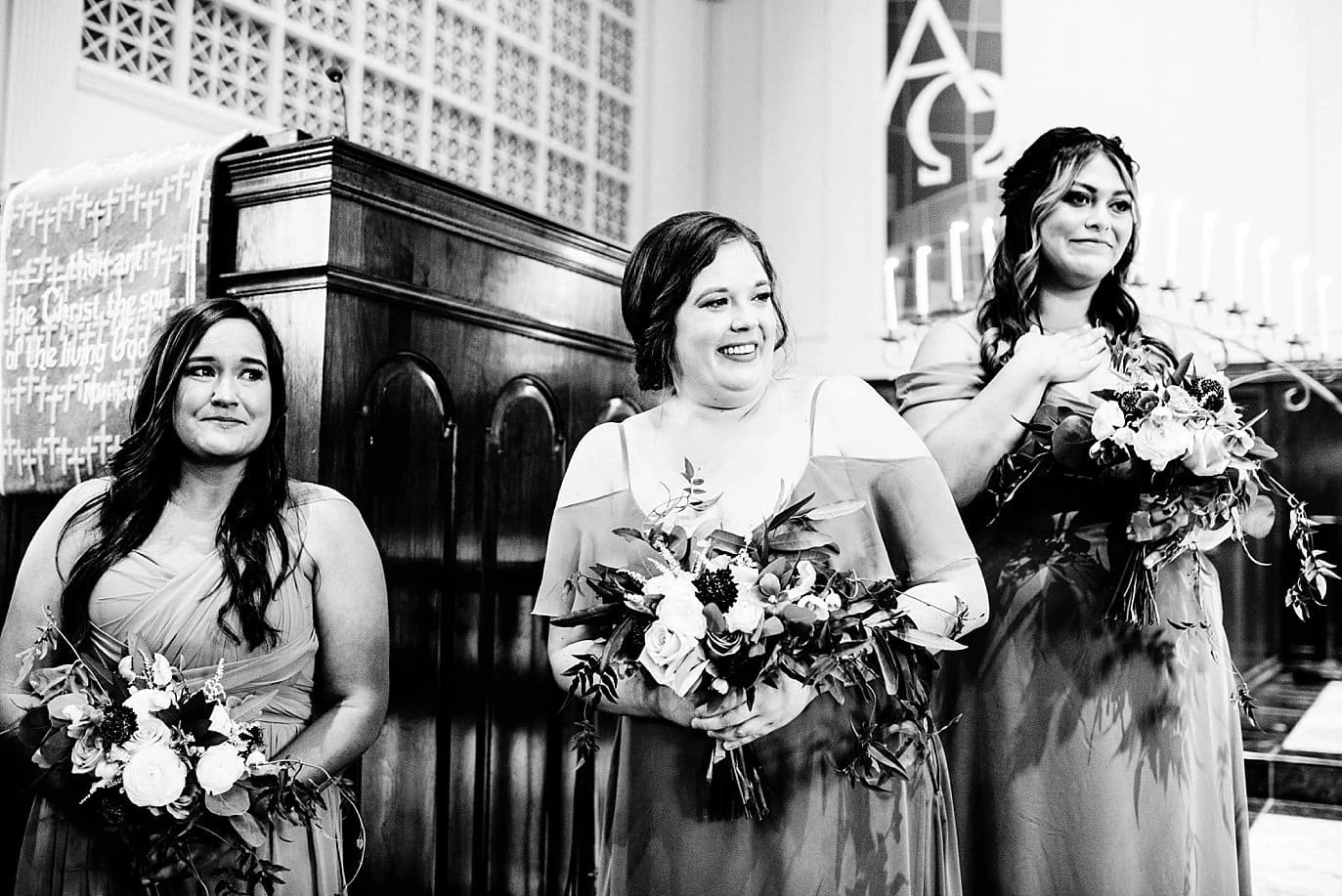 bridesmaids watch bride walk down aisle at church Wichita Falls wedding 