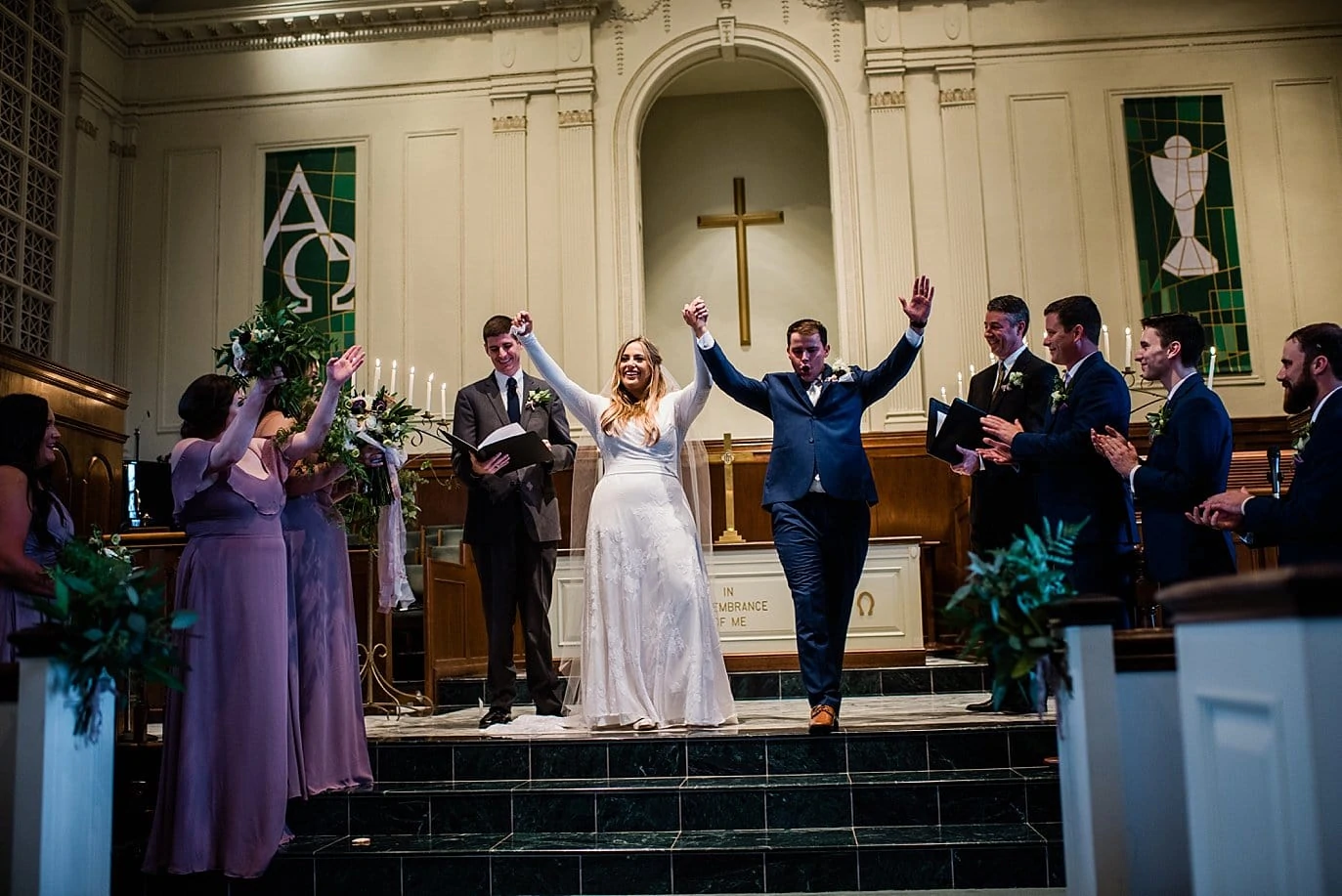 bride and groom celebrate at First Christian Church wedding
