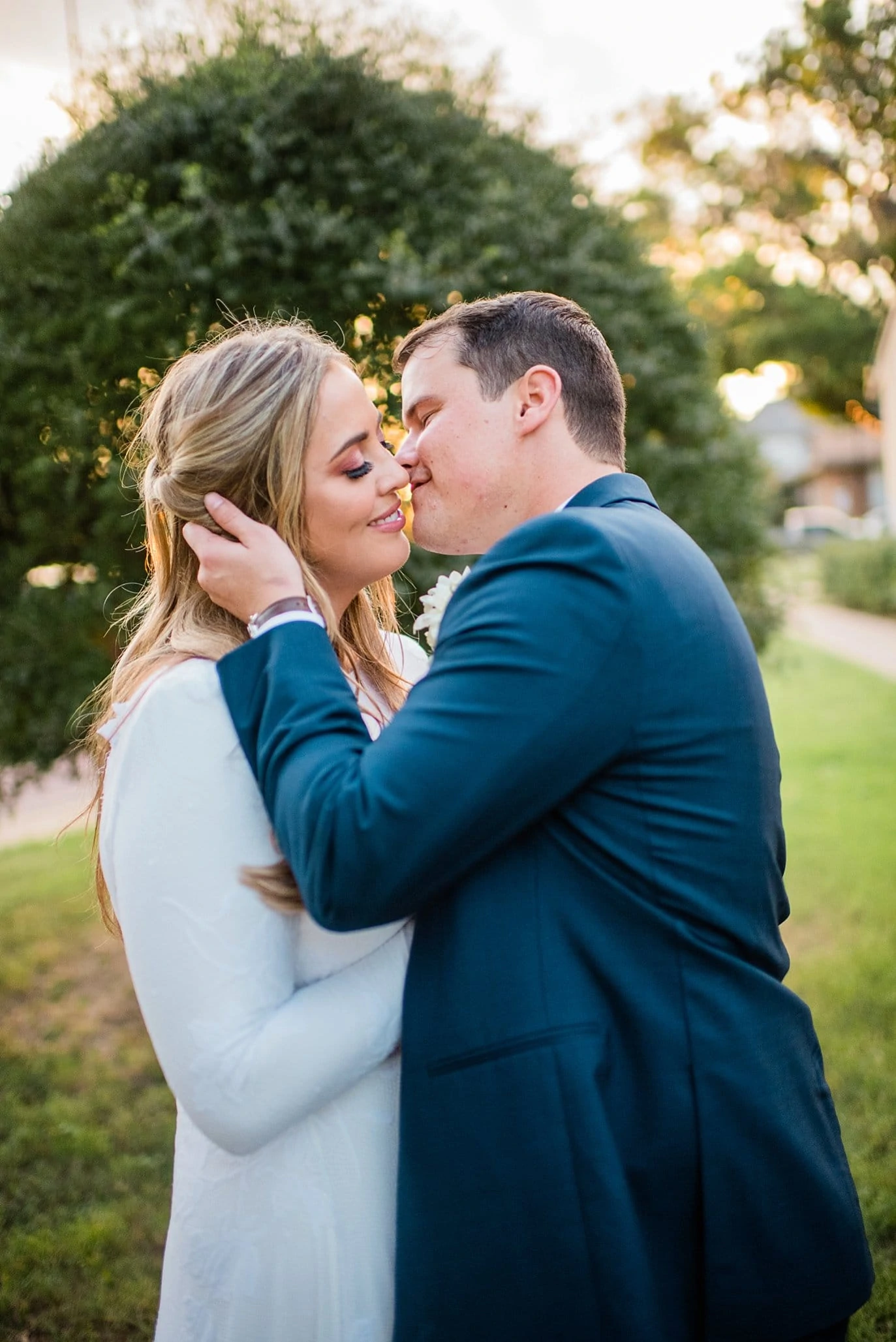 intimate sunset portrait of bride and groom at The Forum Wichita Falls Texas wedding by Wichita Falls wedding photographer Jennie Crate