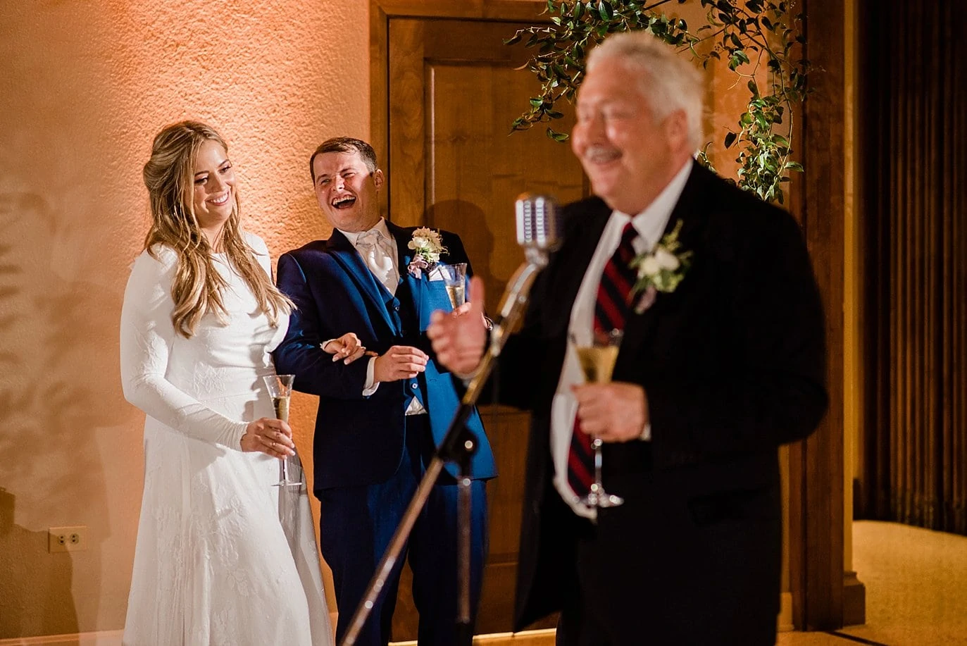 father of bride toasts bride and groom at The Forum Wichita Falls Texas wedding by Dallas wedding photographer Jennie Crate