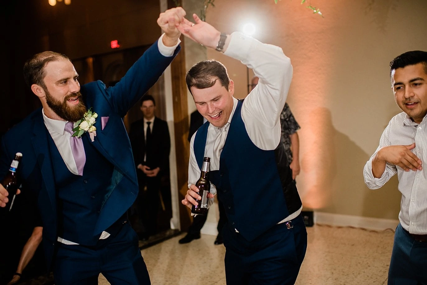 groom dance party at The Forum Wichita Falls wedding by Texas wedding photographer Jennie Crate