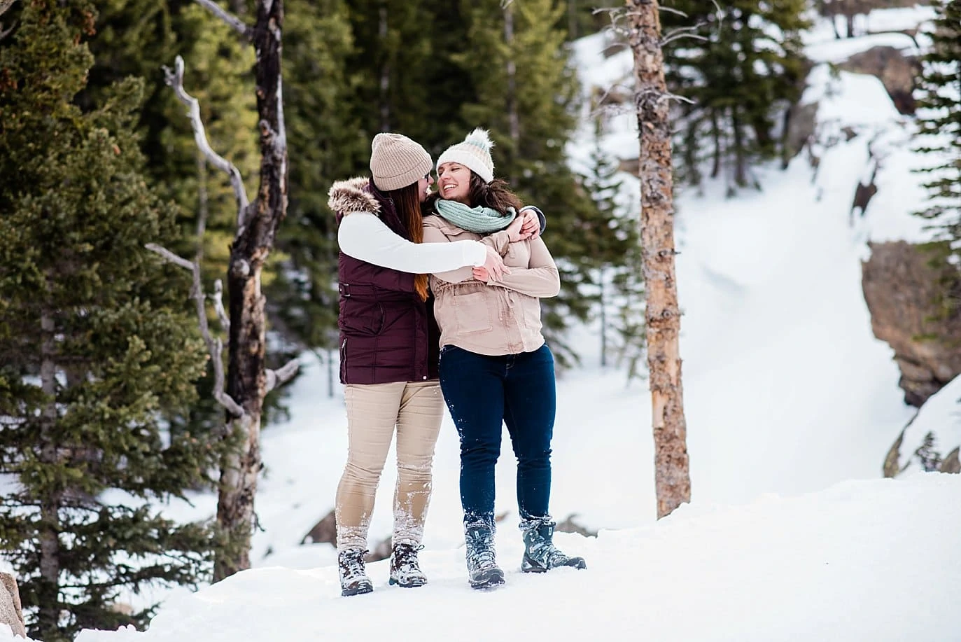 romantic snowy engagement Alberta Falls Rocky Mountain National Park winter hiking engagement by Fort Collins engagement photographer Jennie Crate, Photographer