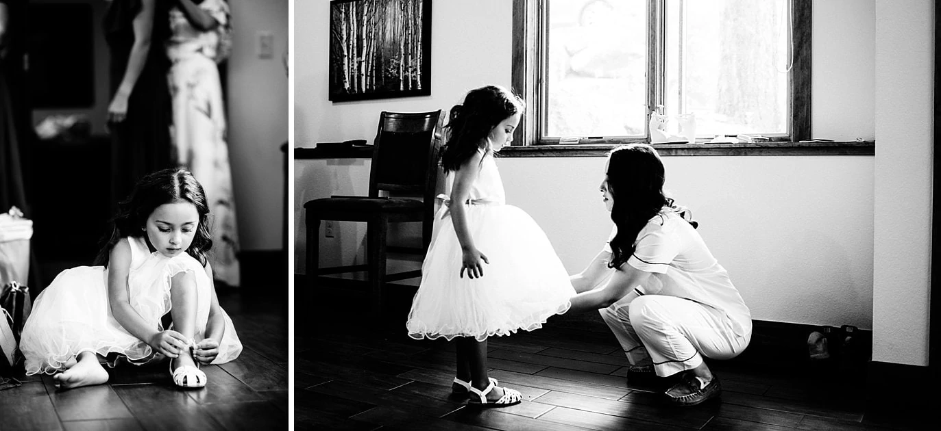 bride and flower girl getting ready at Black Canyon Inn wedding by Estes Park wedding photographer Jennie Crate Photographer