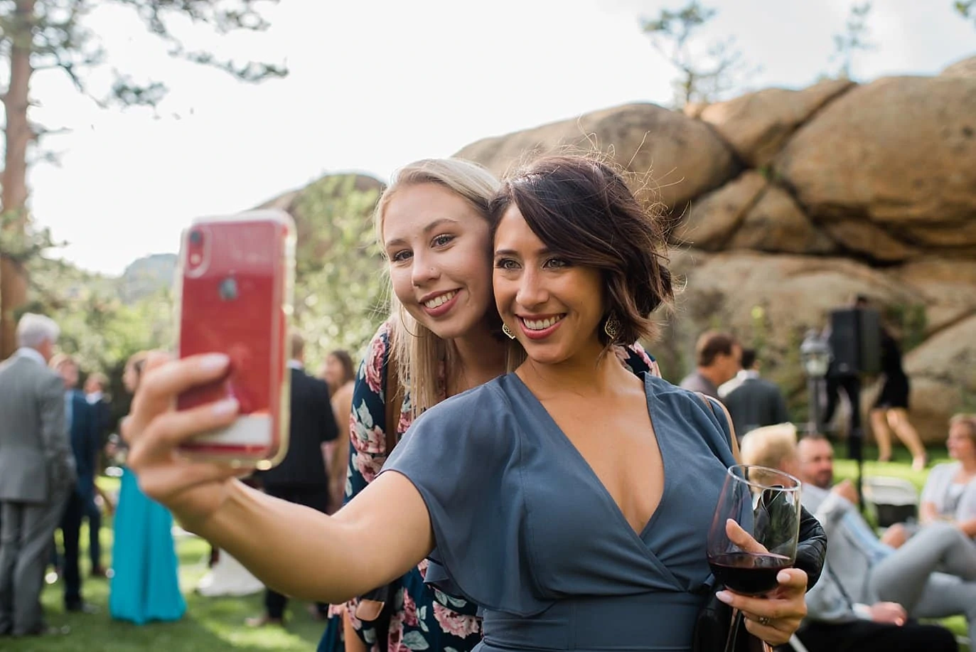 guests take selfie t Twin Owls Steakhouse wedding by Boulder wedding photographer Jennie Crate photographer