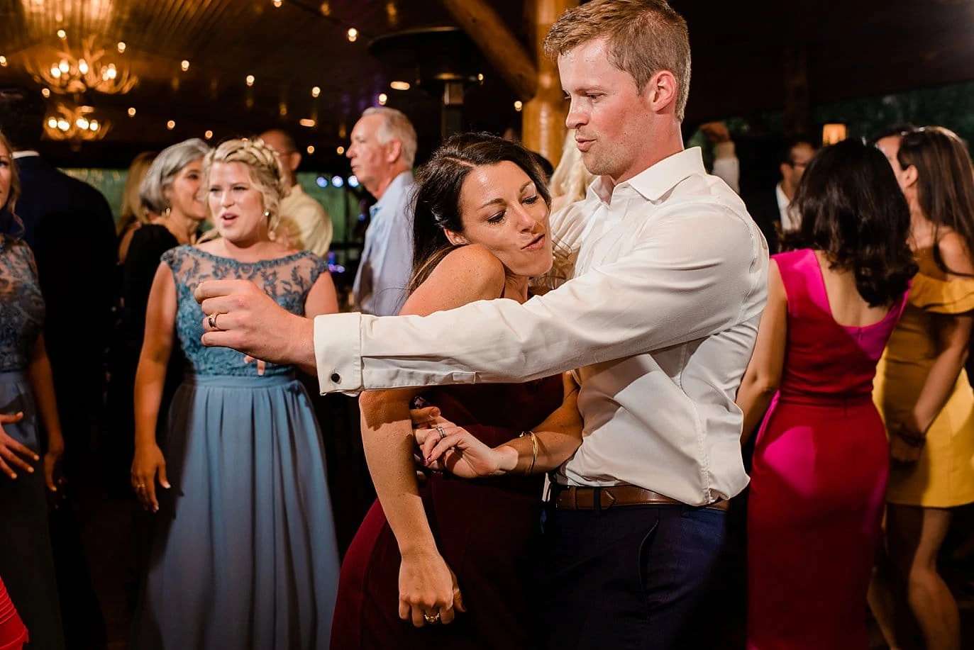 guests dance at outdoor wedding reception at Grand Lake Lodge wedding by Grand Lake wedding photographer Jennie Crate Photographer