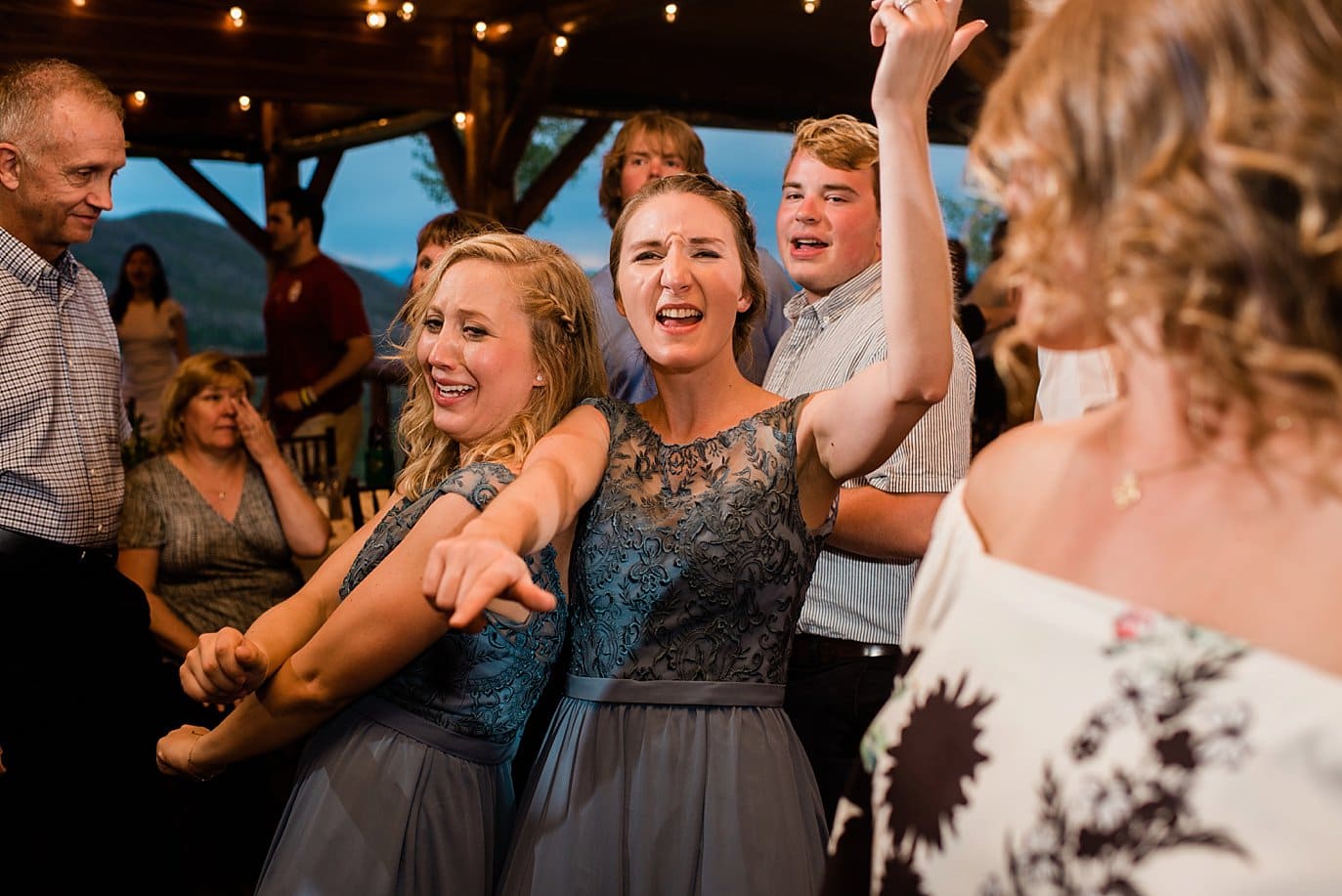 guests dancing at wedding reception at Grand Lake Lodge wedding by Granby wedding photographer Jennie Crate Photographer