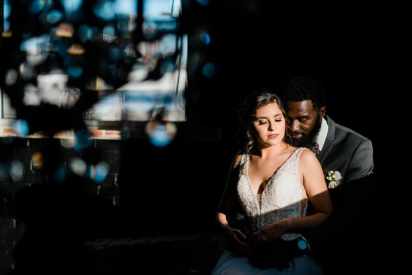 bride and groom creative portrait at Shyft Denver wedding by Lyons wedding photographer Jennie Crate