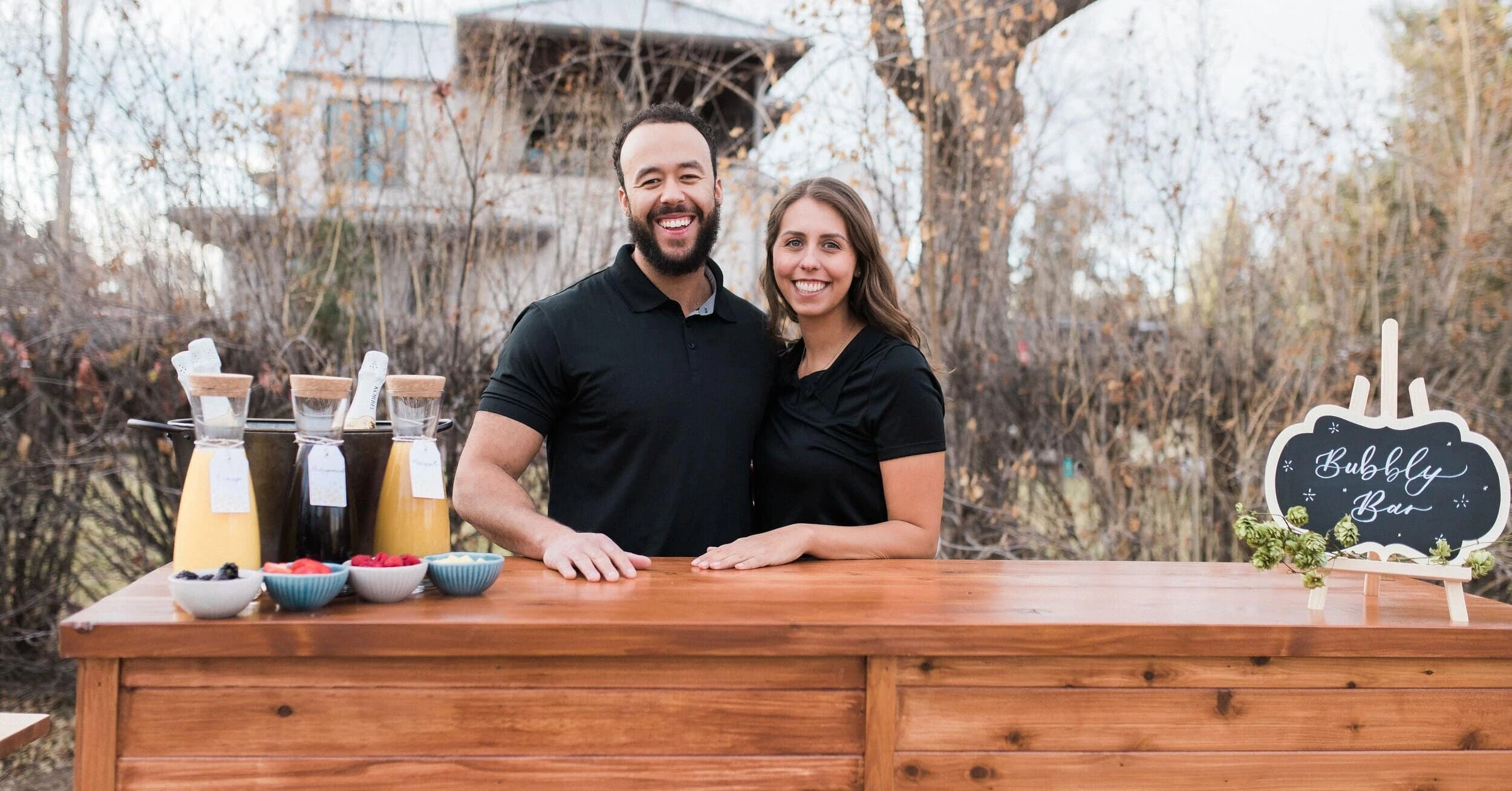 Wandering Wagon Bars co-owners Forest Lloyd and Cassie Lopez mobile bartending