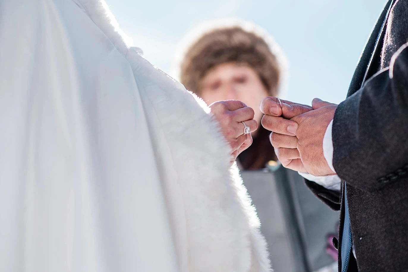 wedding ring exchange at Sapphire Point Elopement by Breckenridge wedding photographer Jennie Crate Photographer