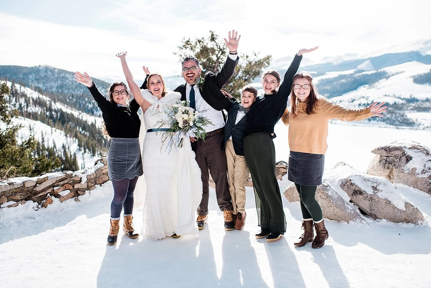 family celebrates after intimate wedding at Sapphire Point Elopement by Breckenridge wedding photographer Jennie Crate Photographer