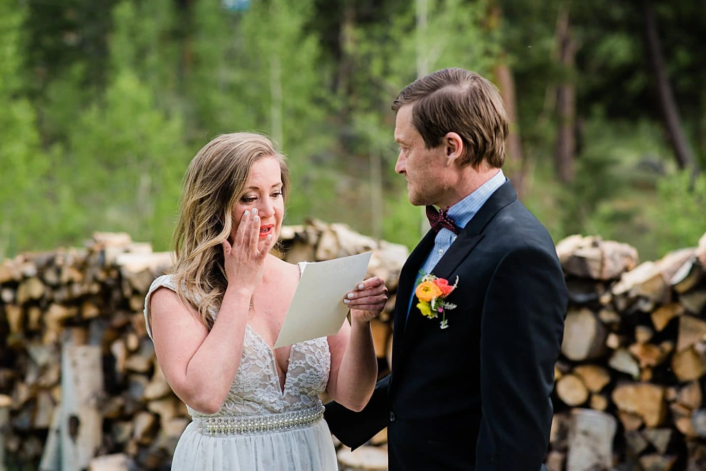 bride cries while reading vows at private property Golden elopement by Golden wedding photographer Jennie Crate