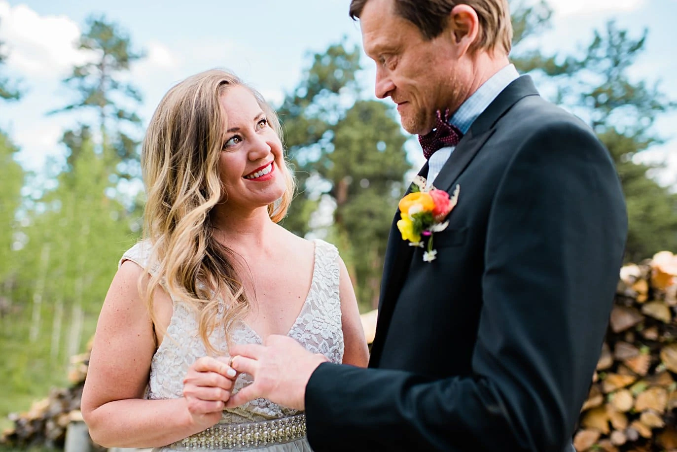 ring exchange during wedding vows at private property Golden elopement by Golden wedding photographer Jennie Crate