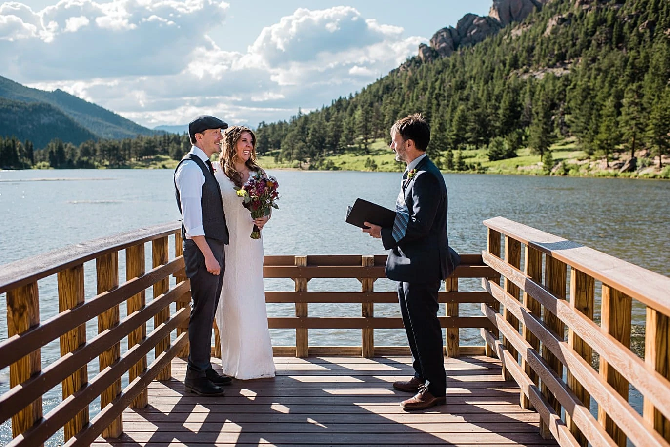 bride and groom say vows at Lily Lake Elopement by Estes Park elopement photographer Jennie Crate