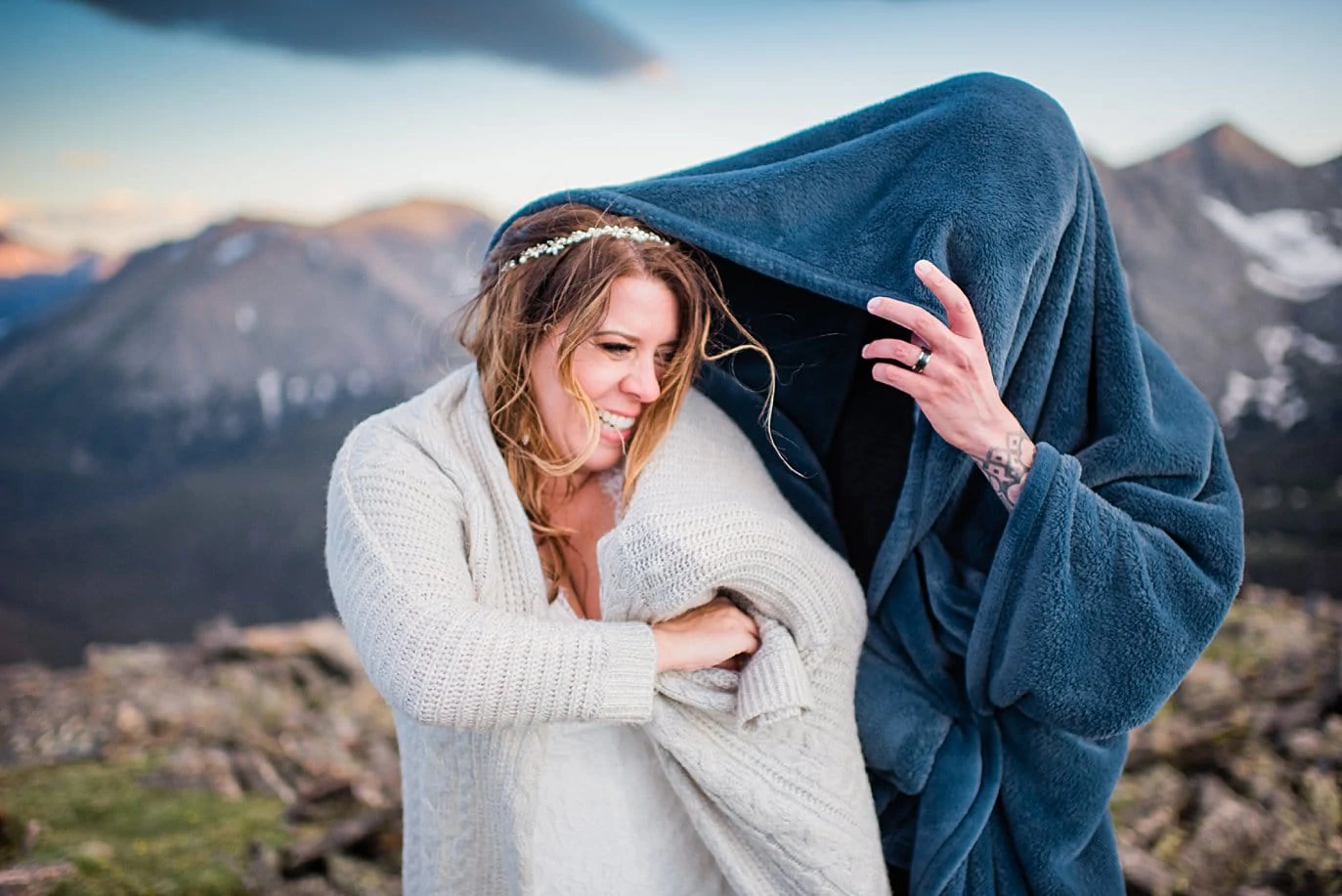 bride and groom put on blankets at Rocky Mountain National Park elopement by Boulder elopement photographer Jennie Crate