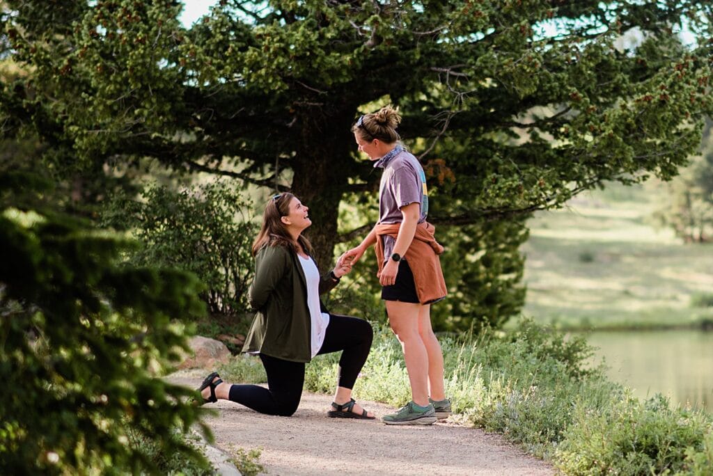 LGBTQ proposal at Estes Park Lily Lake by Estes Park wedding photographer Jennie Crate