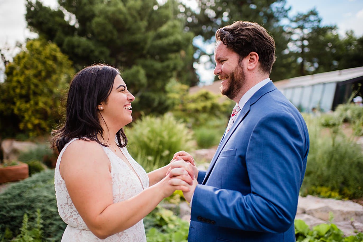bride and groom intimate moment in garden at Denver Botanic Gardens wedding by Boulder Wedding Photographer Jennie Crate