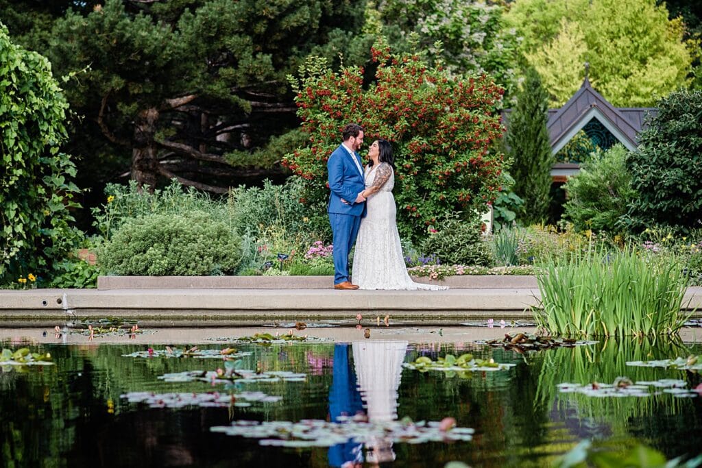 bride and groom during summer wedding at Denver Botanic Gardens wedding by Boulder Wedding Photographer Jennie Crate