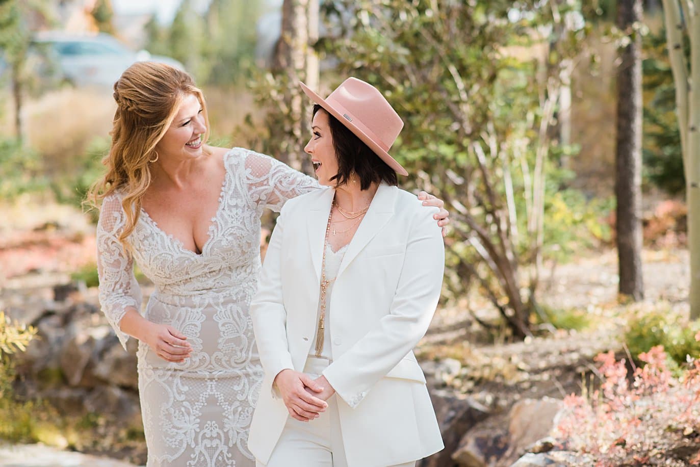 first look between two brides at Boreas Pass microwedding by Breckenridge wedding photographer Jennie Crate