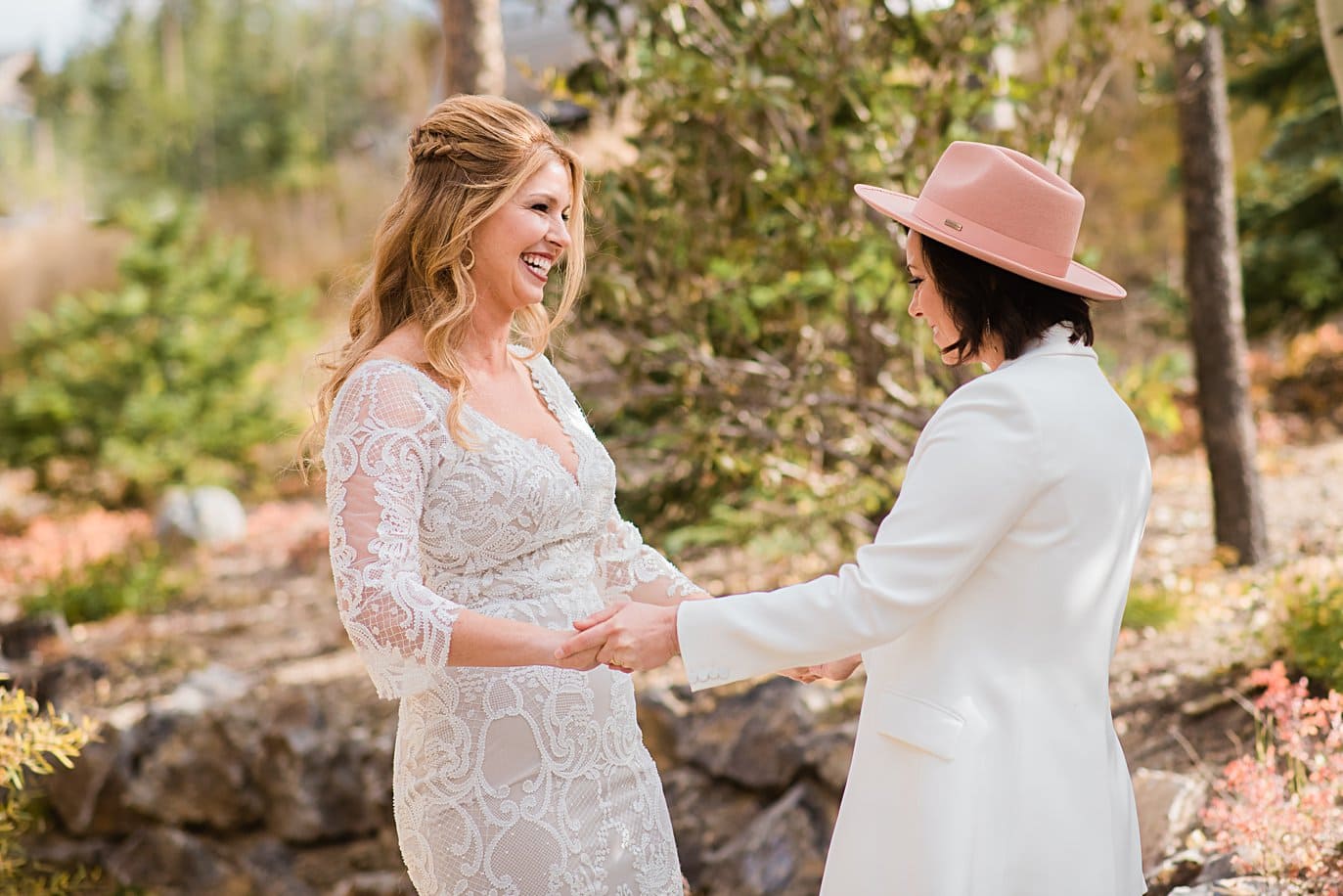 two brides at first look at Boreas Pass microwedding by Breckenridge wedding photographer Jennie Crate