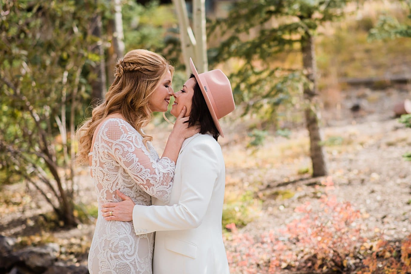 two brides at first look at Boreas Pass microwedding by Breckenridge wedding photographer Jennie Crate
