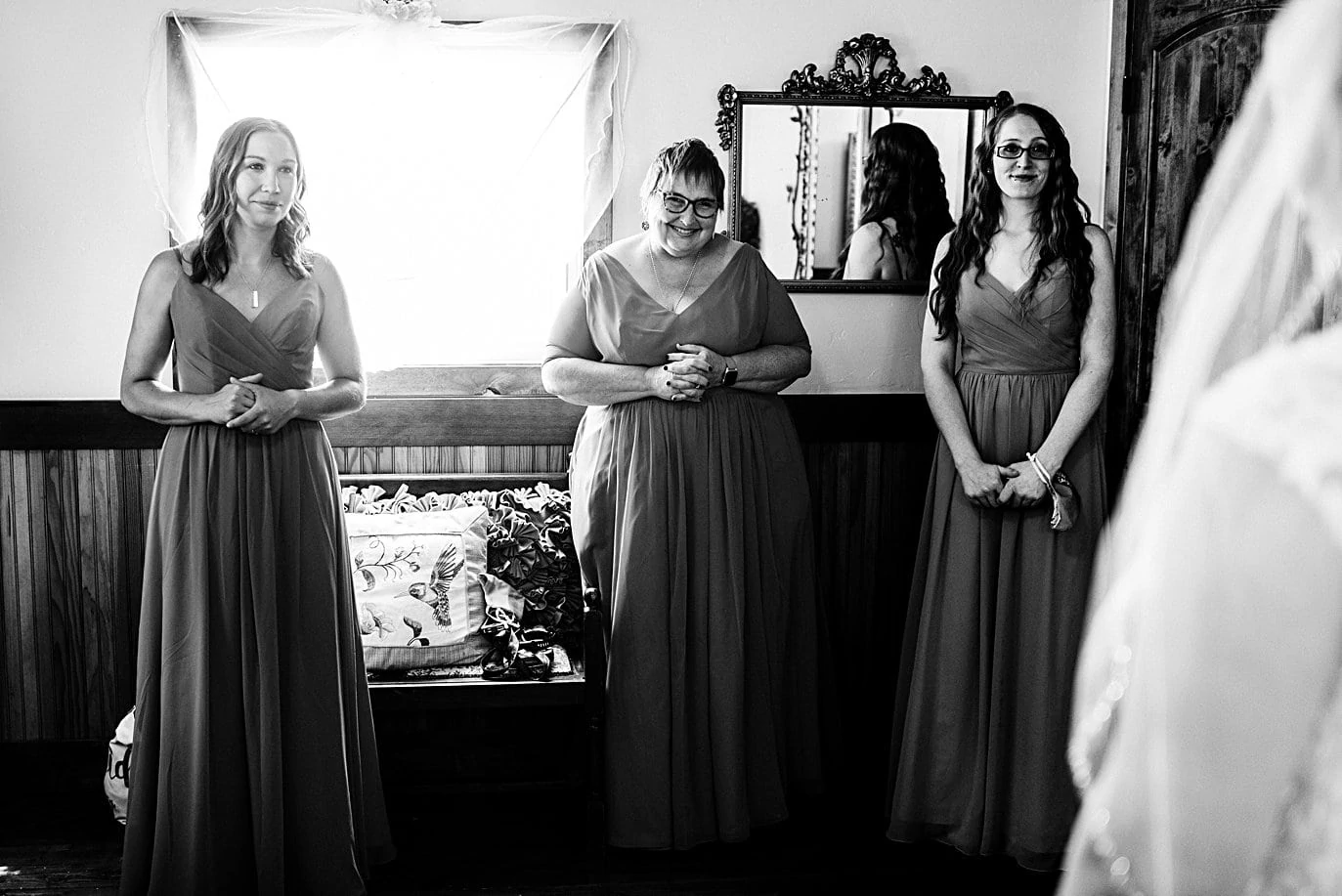 brides mom looks on during getting ready at Deer Creek Valley Ranch wedding by Conifer wedding photographer Jennie Crate