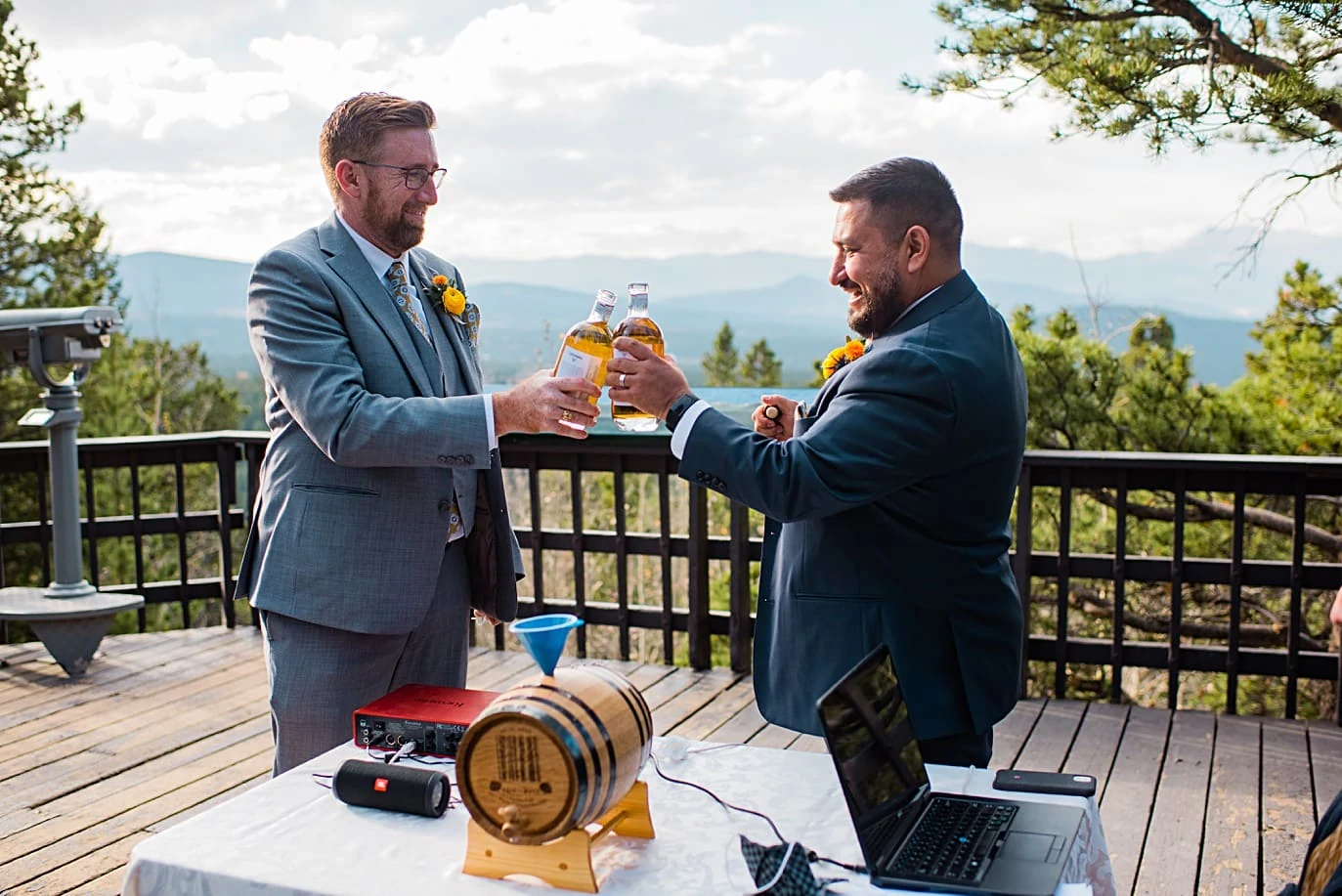 grooms toast with whiskey during whisky ceremony at Golden Gate Canyon microwedding by Golden wedding photographer Jennie Crate