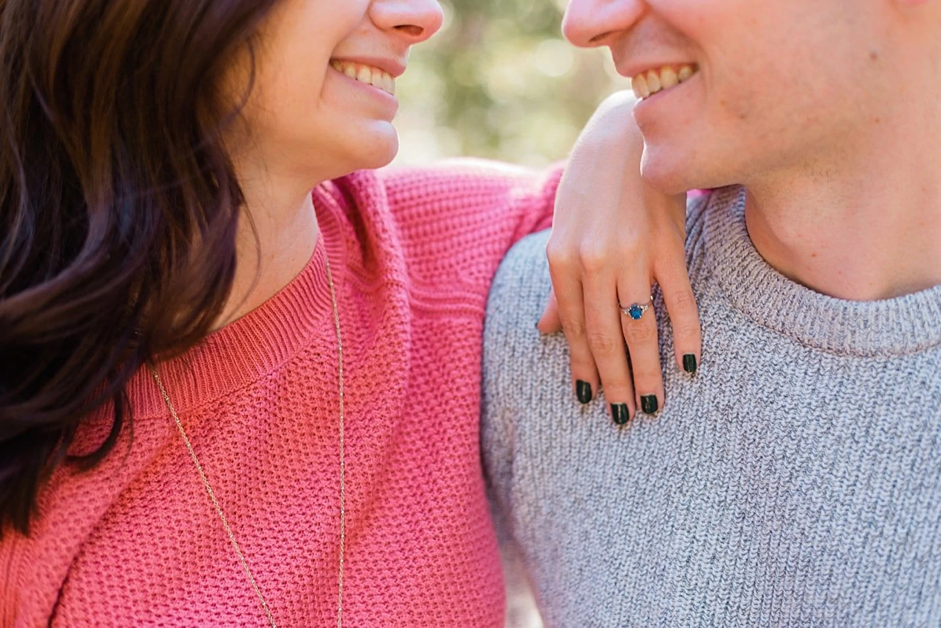 intimate moment with sapphire engagement ring Mitchell Lake engagement session by Boulder engagement photographer Jennie Crate
