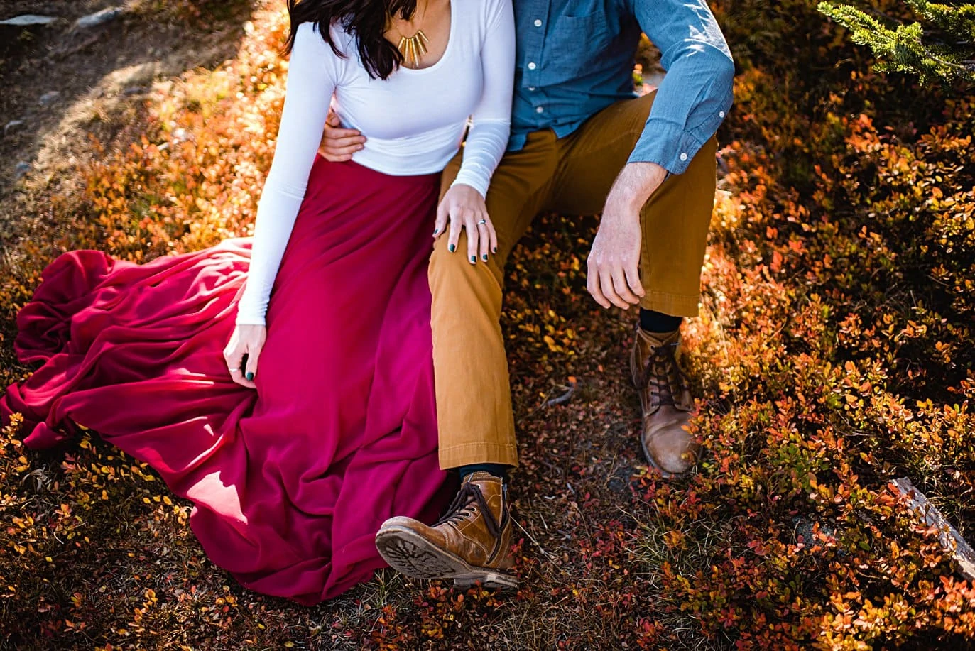 maroon skirt white top stylish fall engagement outfit by Denver engagement photographer Jennie Crate