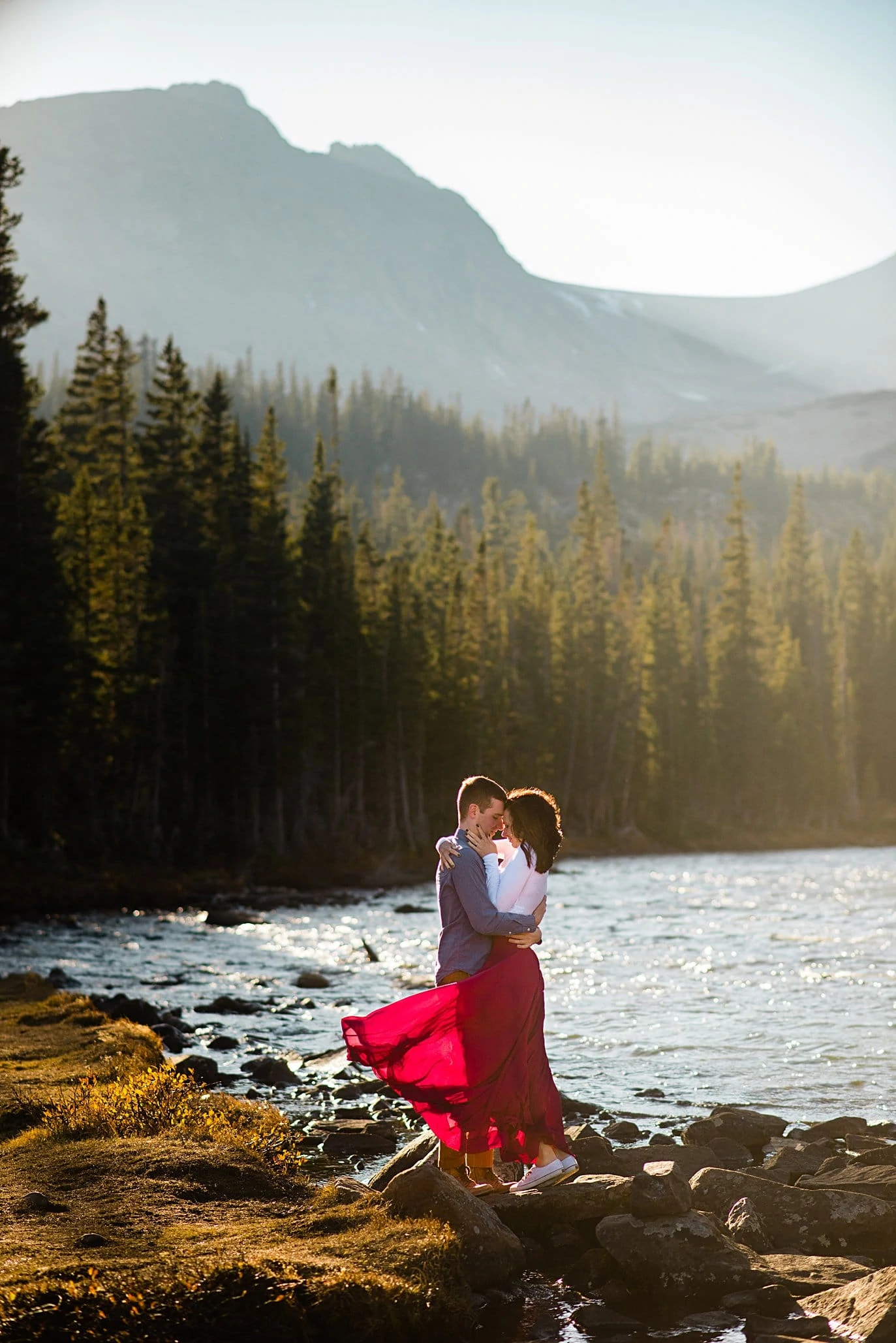 sunset engagement at Mitchell Lake with maroon skirt by Boulder engagement photographer Jennie Crate