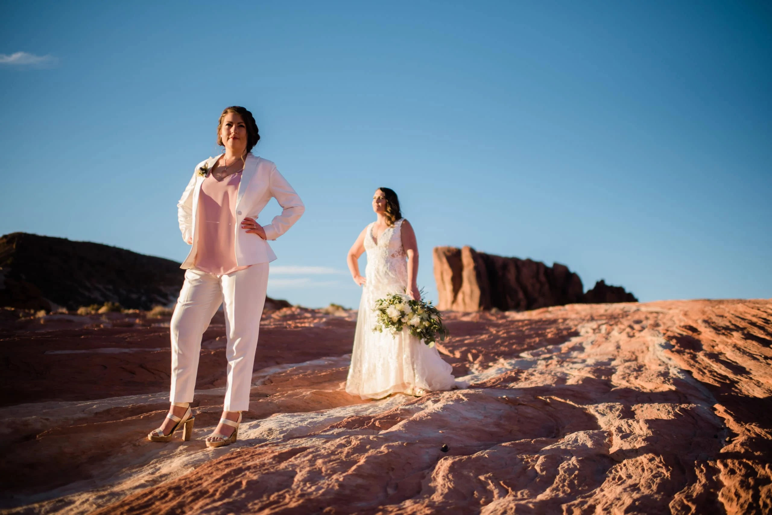 a bride wears a tailored lgbtq+ wedding suit