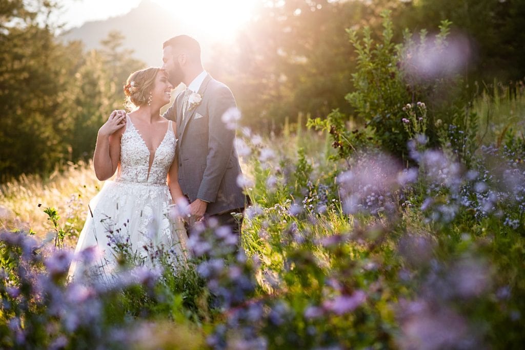 sunset portrait with wildflowers at Della Terra Mountain Chateau wedding