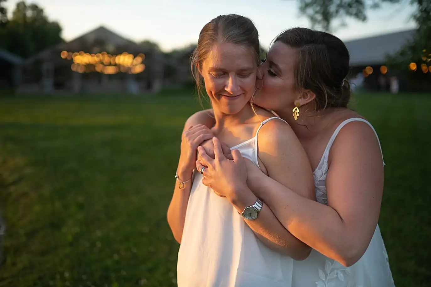 sunset photos of two brides at Jorgensen Farms Wedding columbus ohio