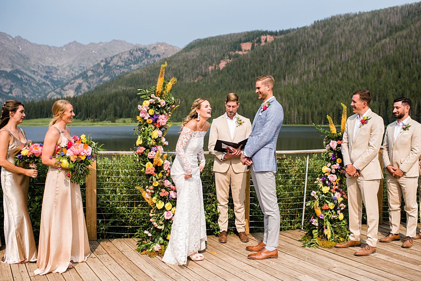 bride and groom laugh during vows at Piney Lake wedding