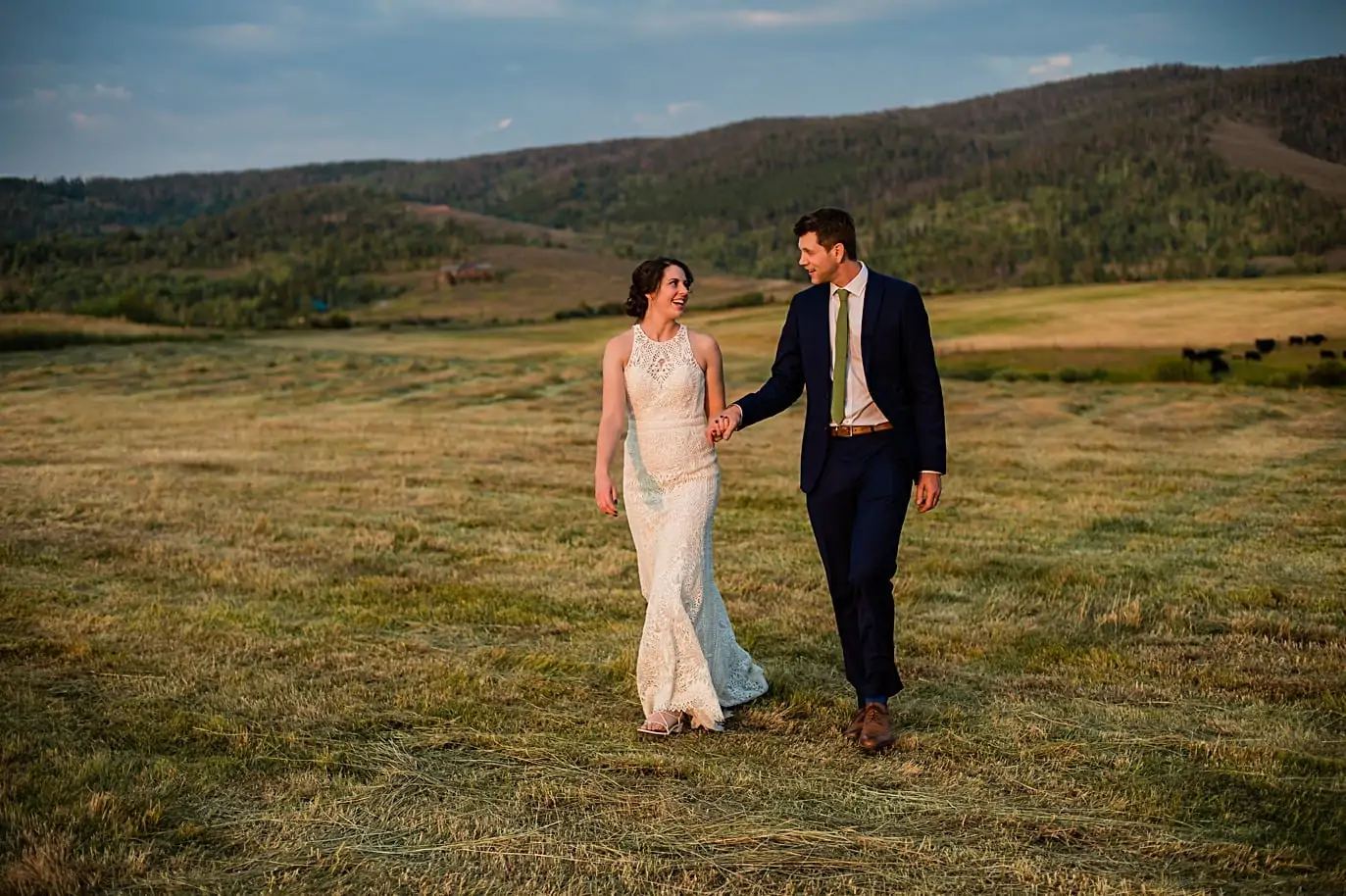 sunset walk in the fields at a wedding in the Colorado mountains