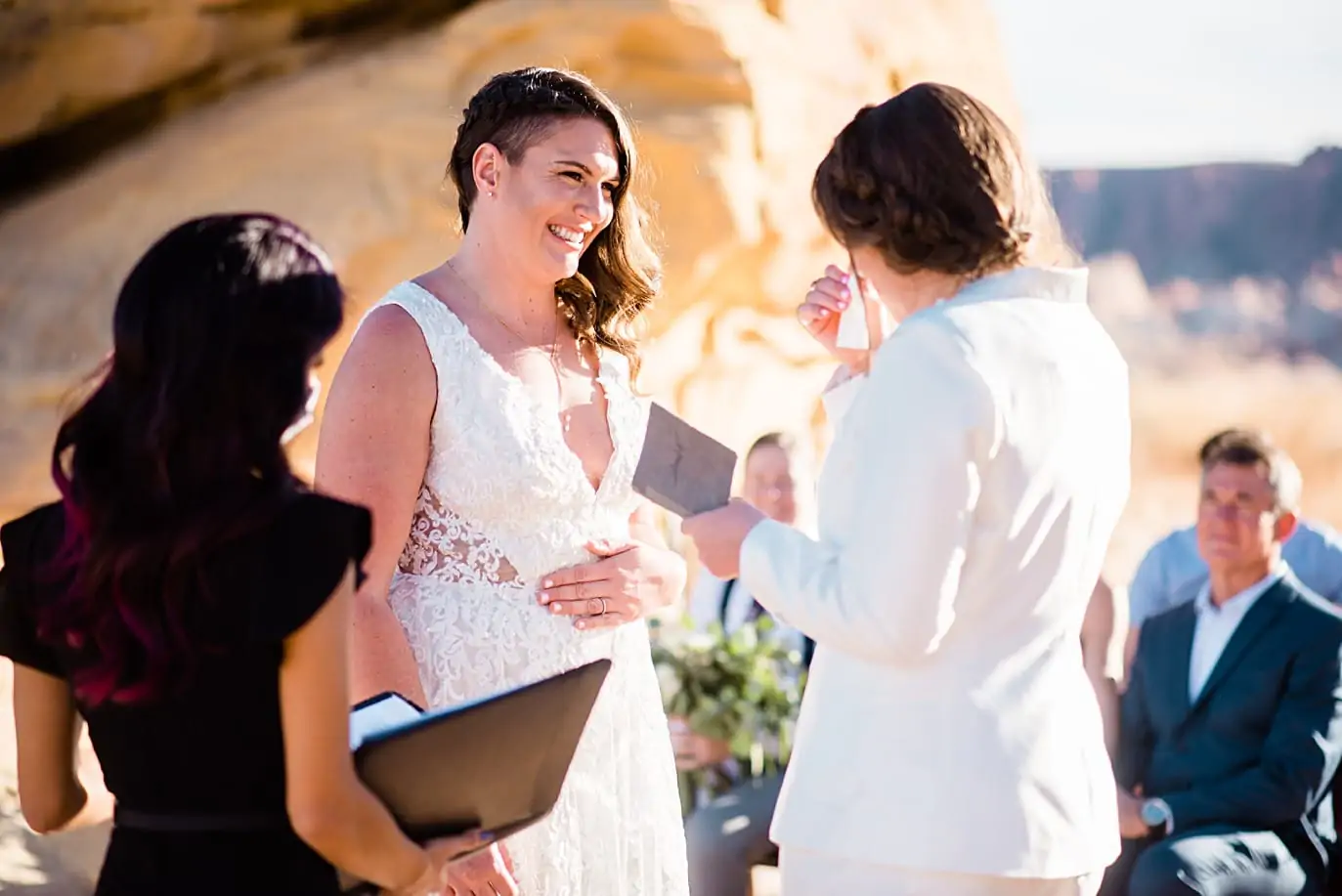 brides reading vows at their Valley of Fire State Park wedding in Nevada