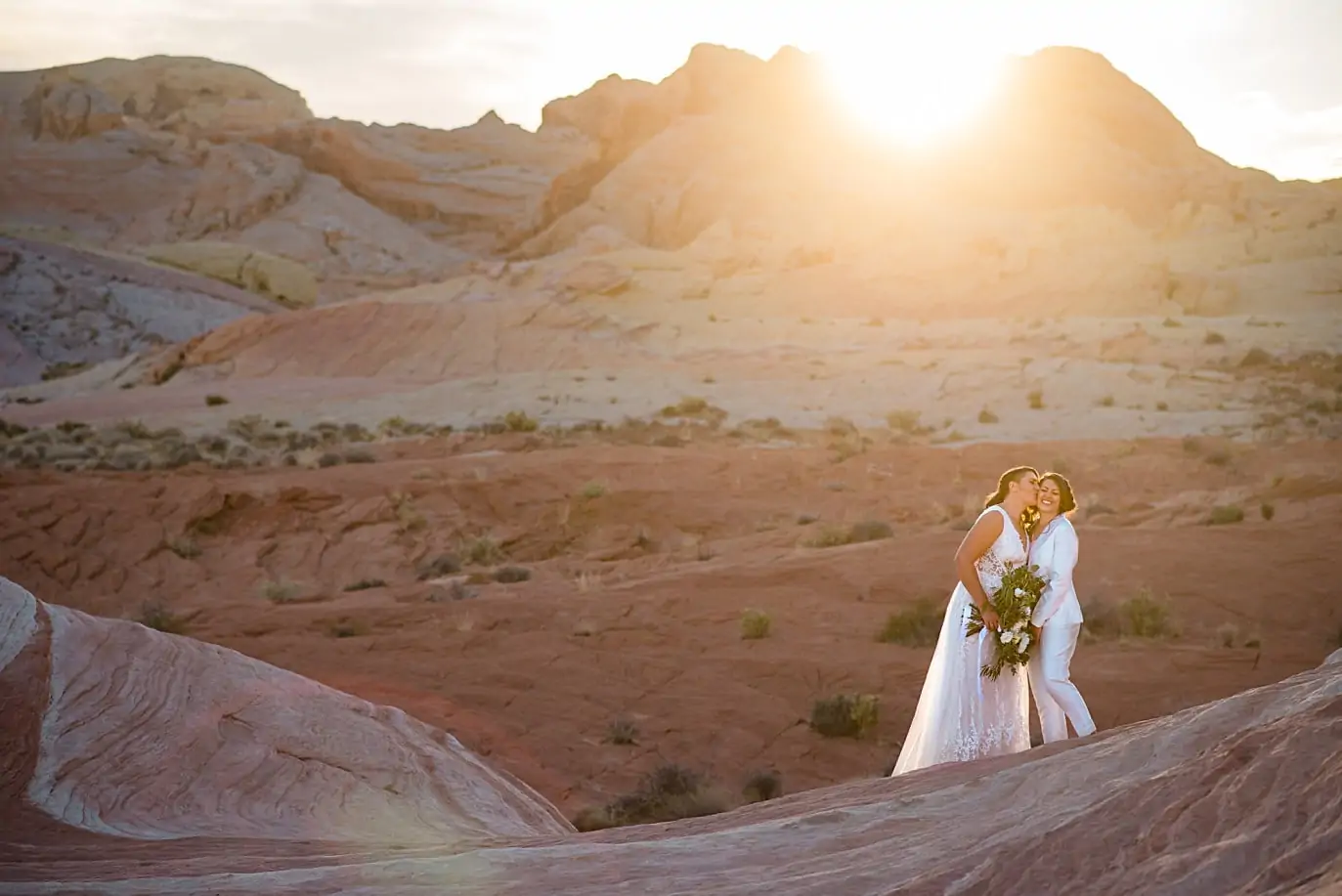 two brides at sunset at Fire Wave trail in Valley of Fire State Park wedding