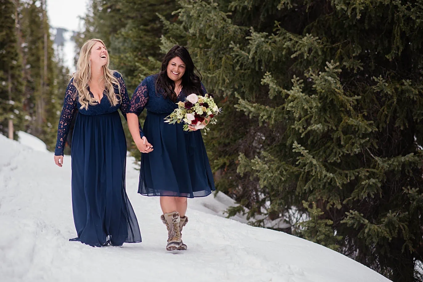 Mayflower Gulch winter hiking elopement two brides in navy blue wedding dresses